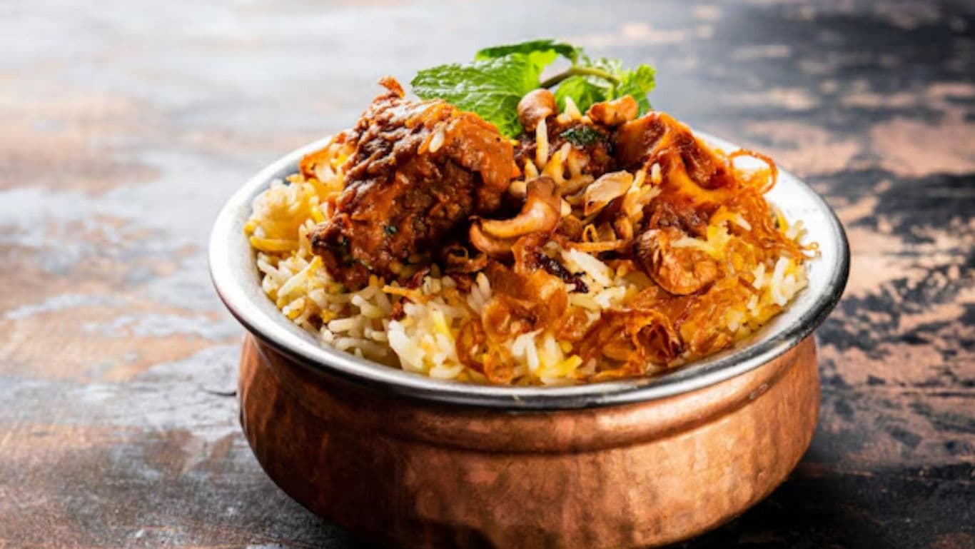 Traditional Chicken Biryani Served in Copper Bowl
