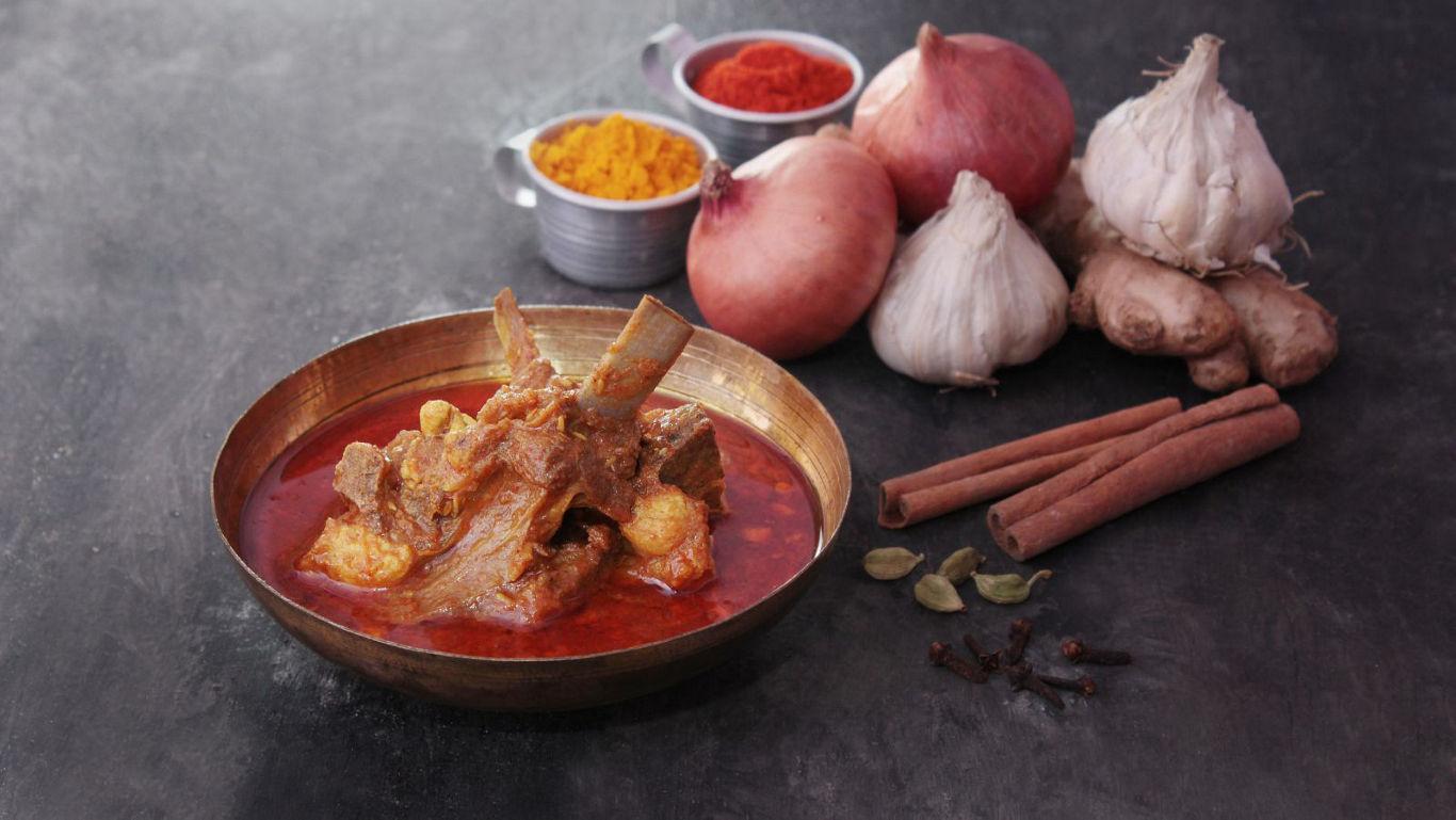 Mutton rezala in its mil, creamy Mughlai gravy