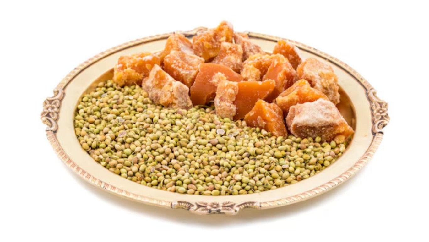 Plate with jaggery chunks and lentils