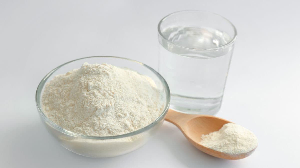 flour in a bowl with water on the side