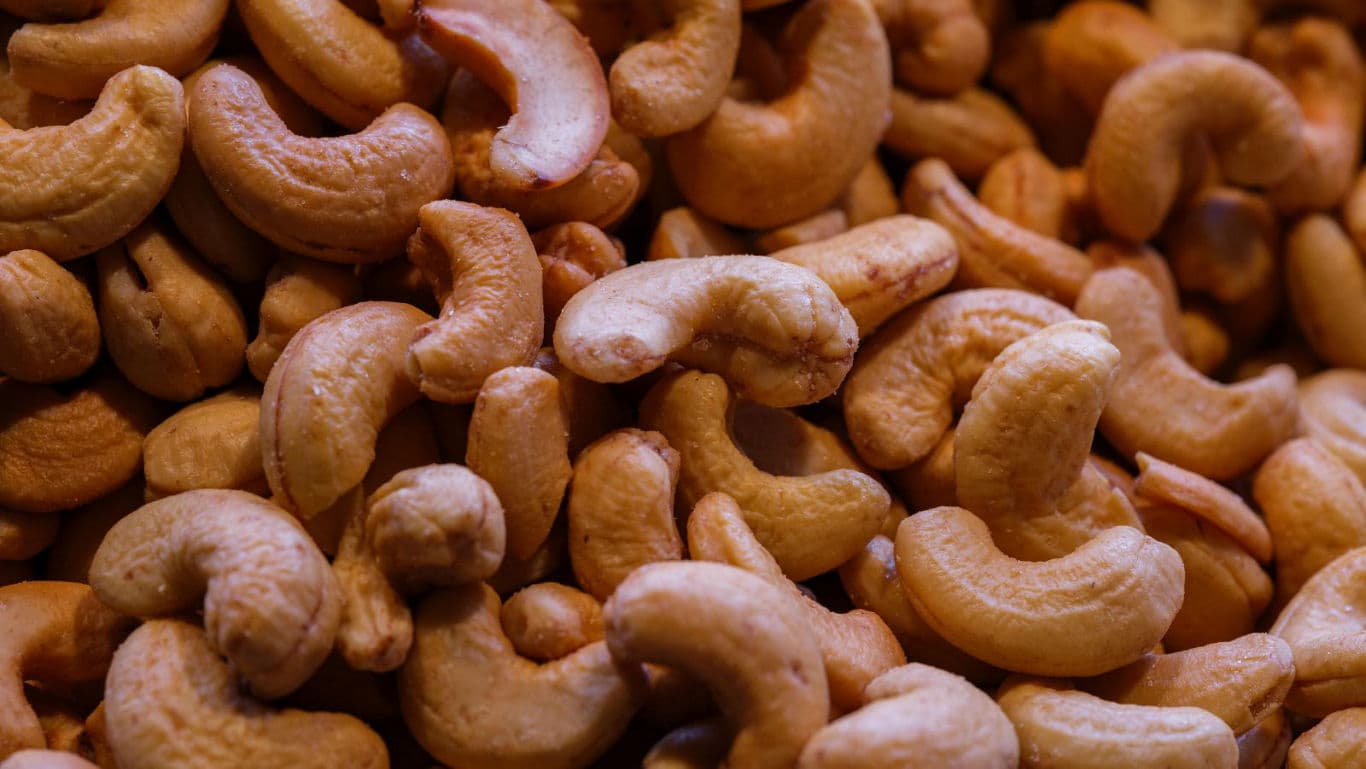 Close-up of roasted cashew nuts in bulk