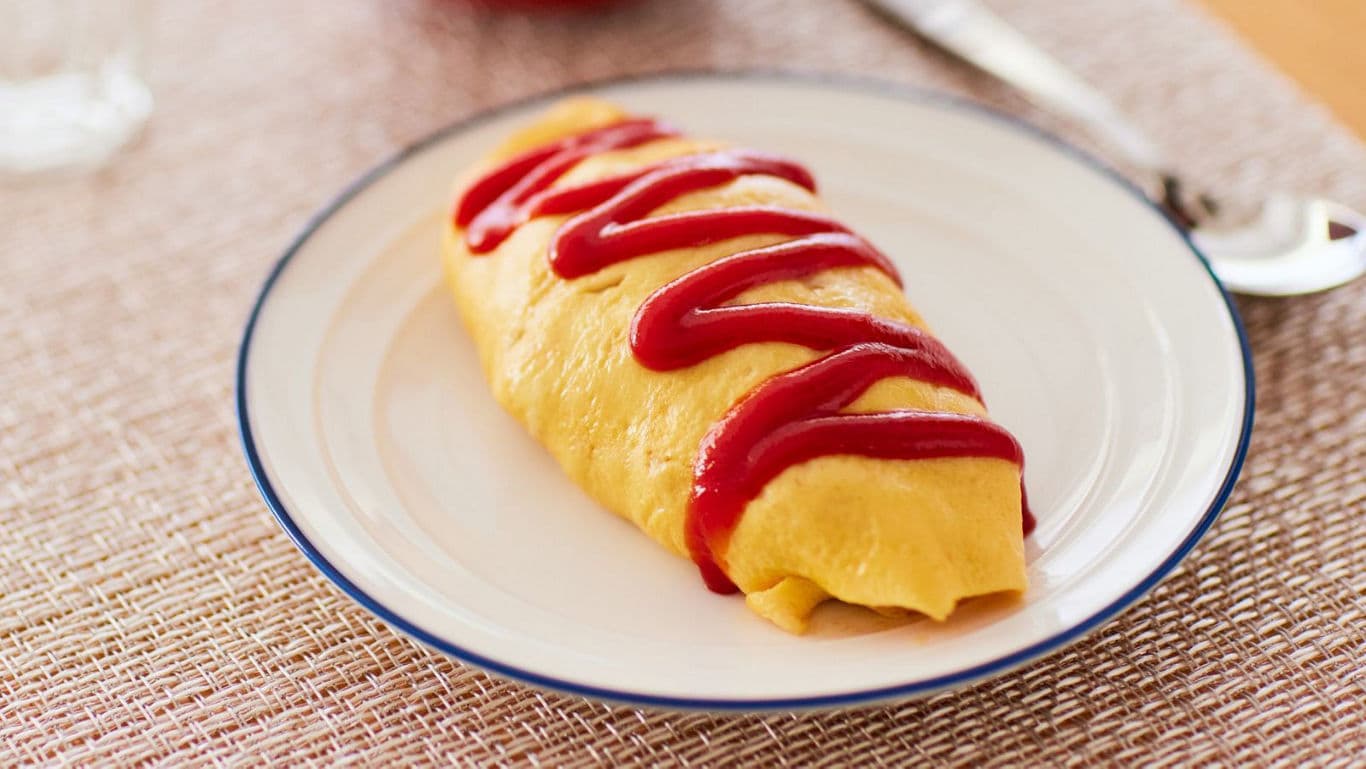 Japanese omelette rice topped with ketchup