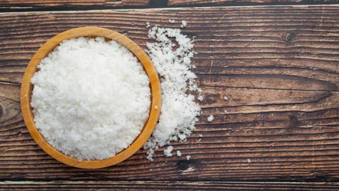 Wooden bowl of coarse sea salt