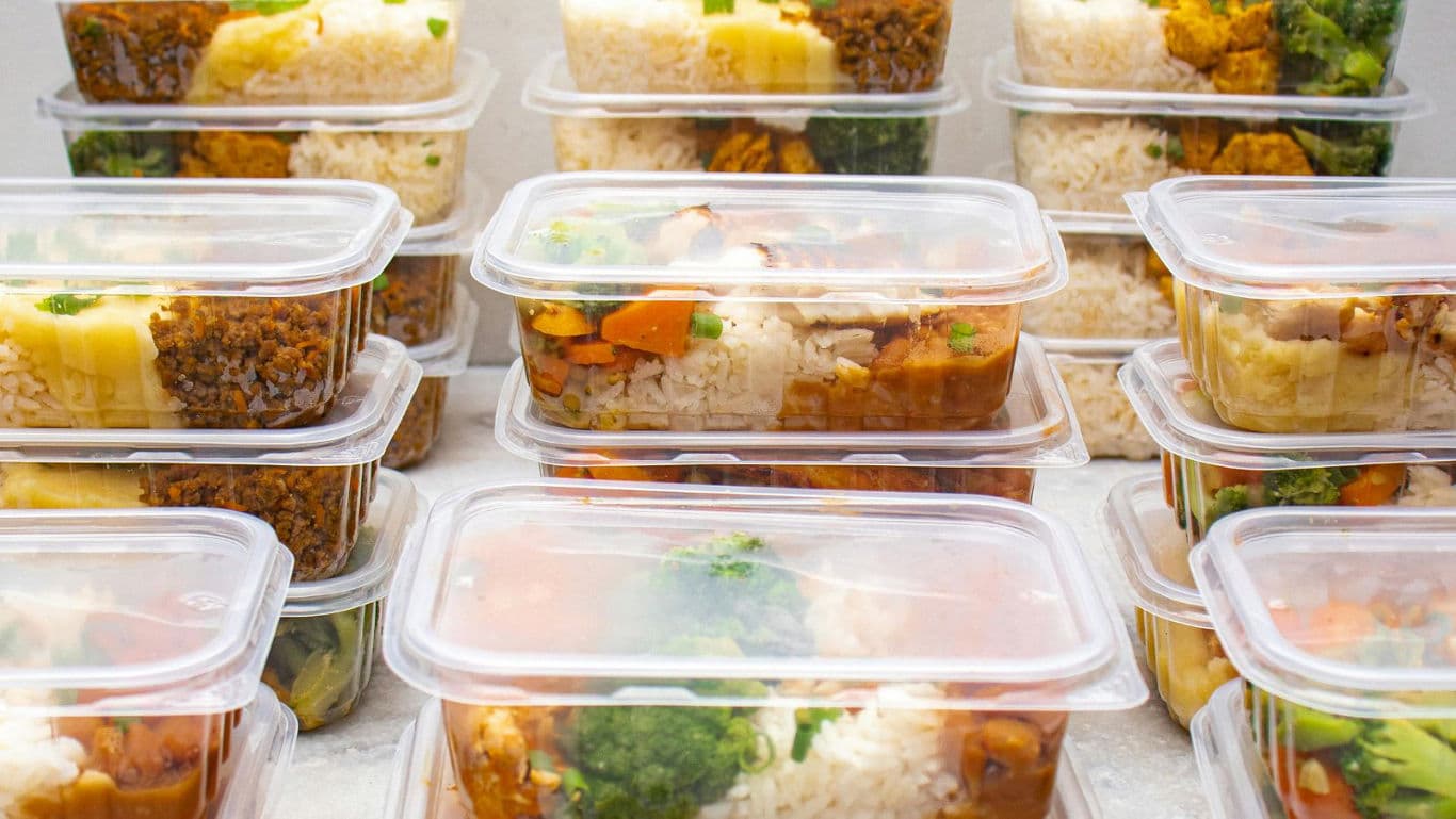 Stacked Meal Prep Containers With Rice and Vegetables
