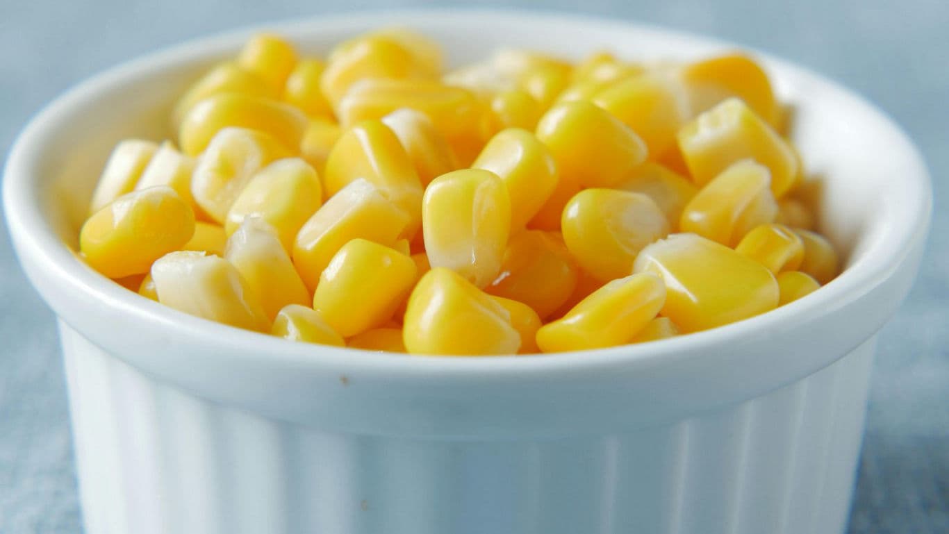 Close-up of sweet corn kernels in white ramekin