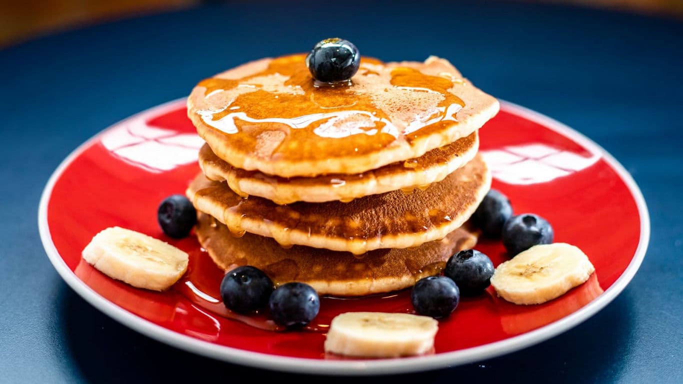 Stack of Pancakes with Blueberries and Bananas