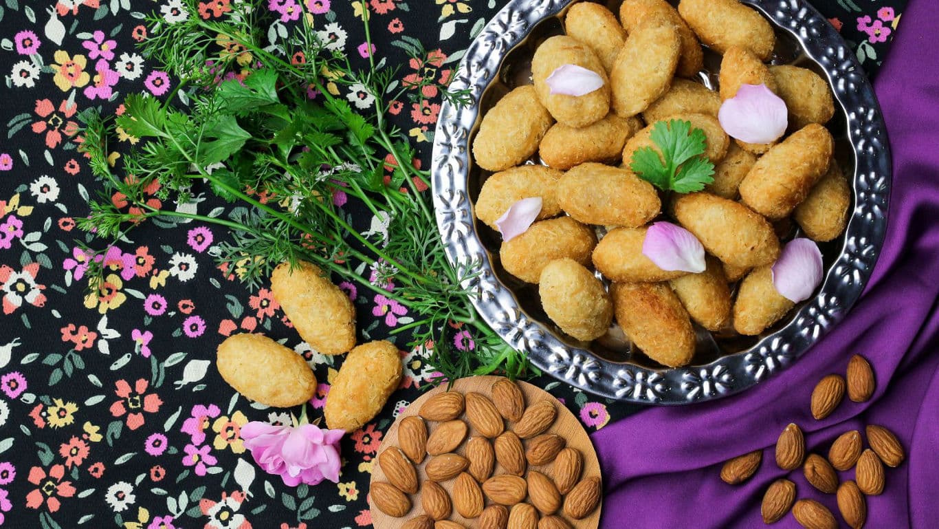 Golden fried snacks with almonds and herbs