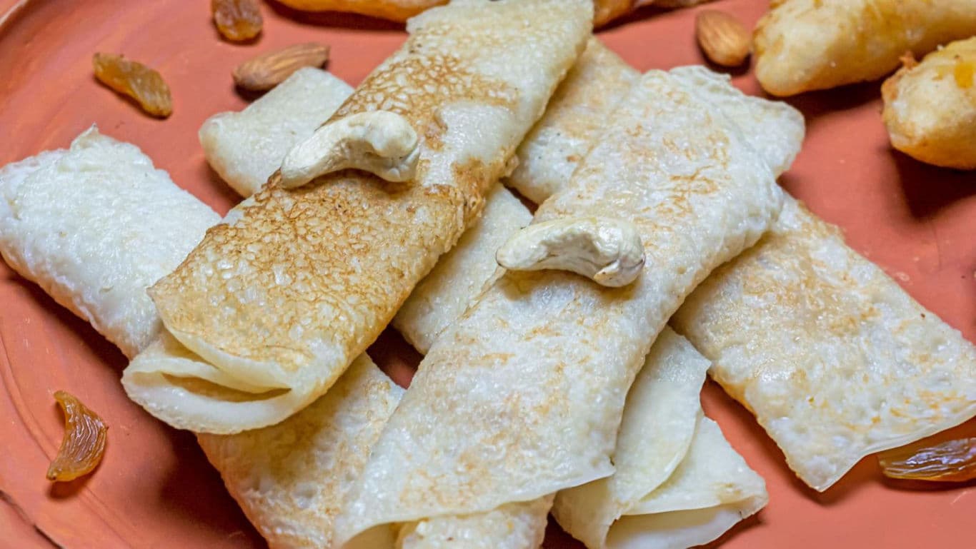 Rolled Pancakes with Nuts and Raisins