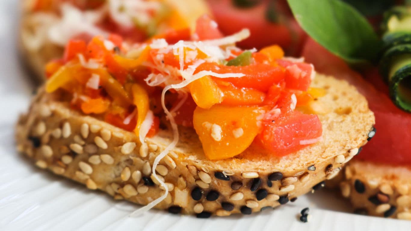 Sesame crusted bruschetta with fresh vegetables