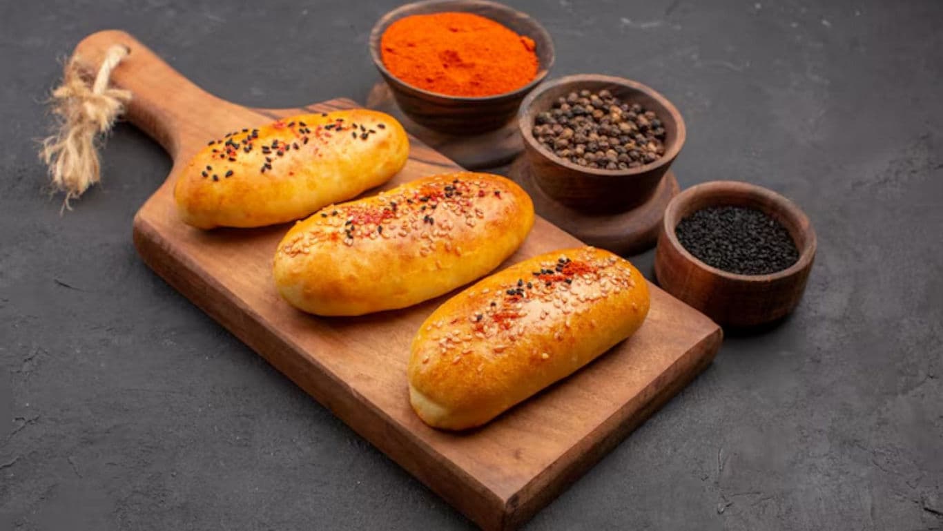 Freshly Baked Buns with Assorted Spices on Board