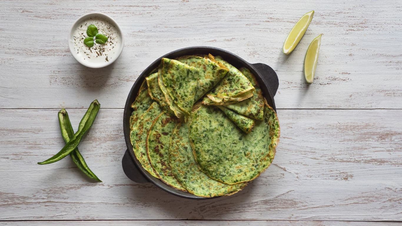Herbed Savory Pancakes in Cast Iron Pan Overhead