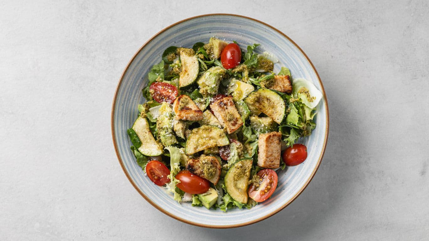 Fresh Chicken Caesar Salad with Avocado and Tomato