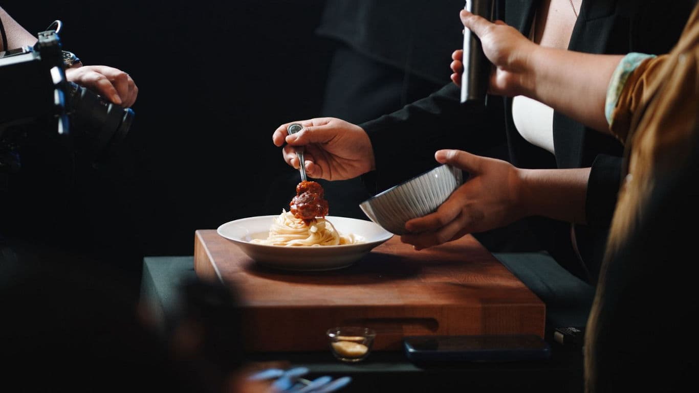 Plated food being shot for video.