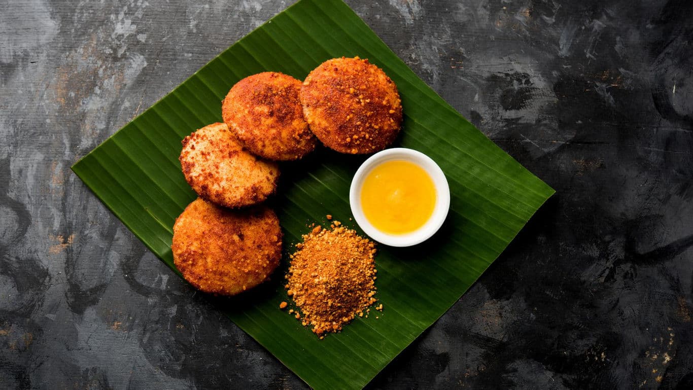 South Indian Fried Snacks on Banana Leaf with Dip