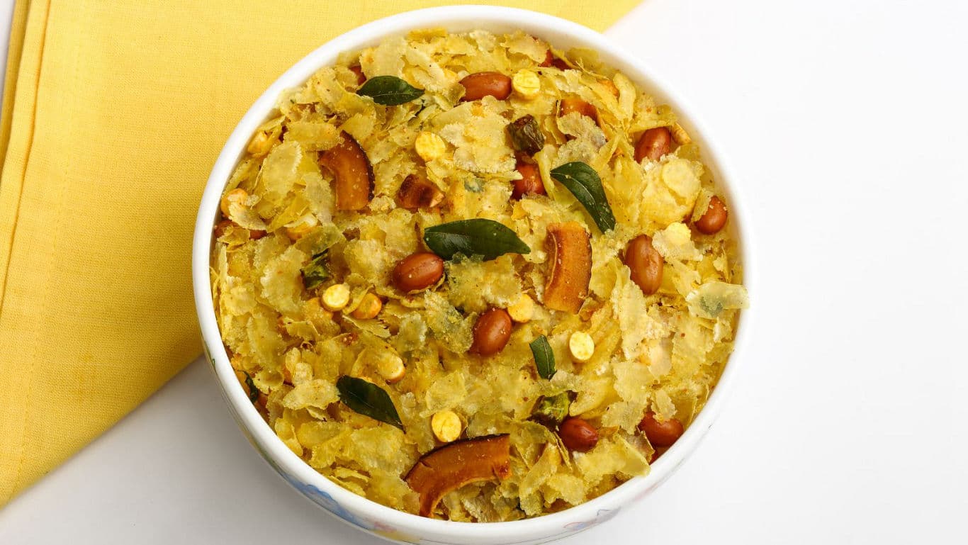 Traditional Indian Poha Chivda Snack in White Bowl