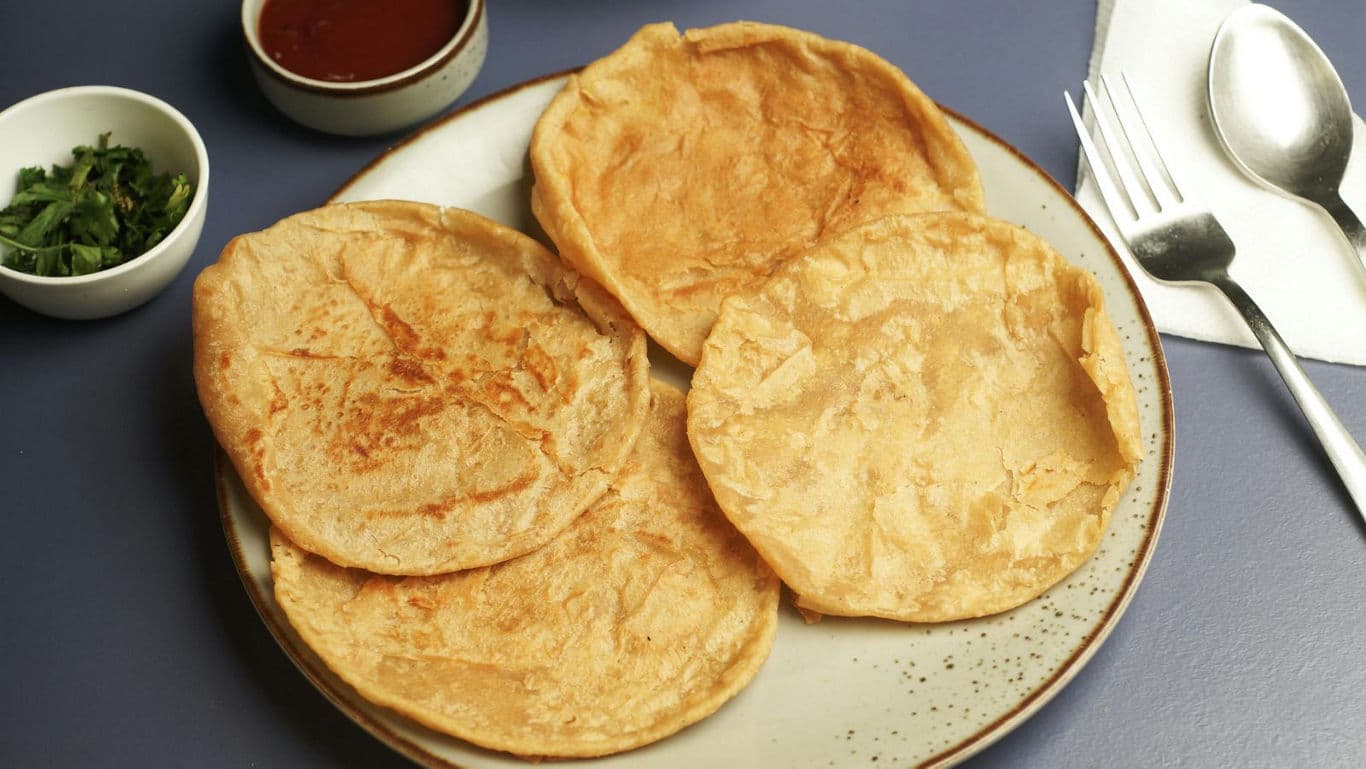 Freshly cooked flatbreads on a plate