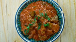 posto-mangsho-recipe-a-bengali-recipe-featuring-mutton-curry-with-poppy-seed-paste-thumbnail