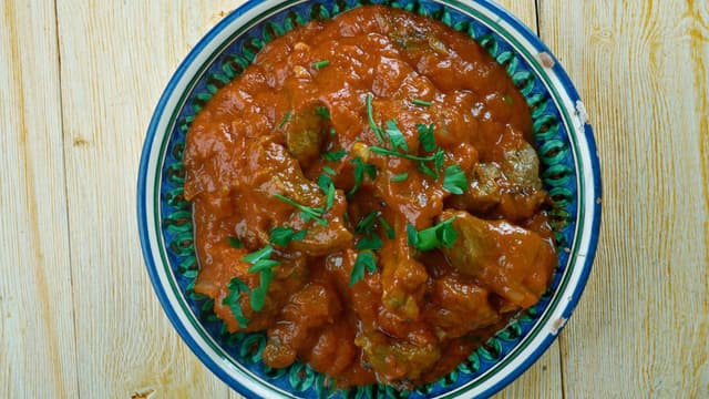 posto-mangsho-recipe-a-bengali-recipe-featuring-mutton-curry-with-poppy-seed-paste-thumbnail