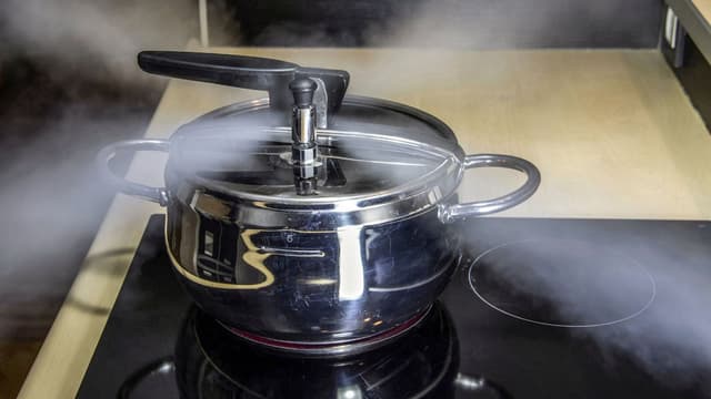 Pressure cooker on a stovetop - banner image