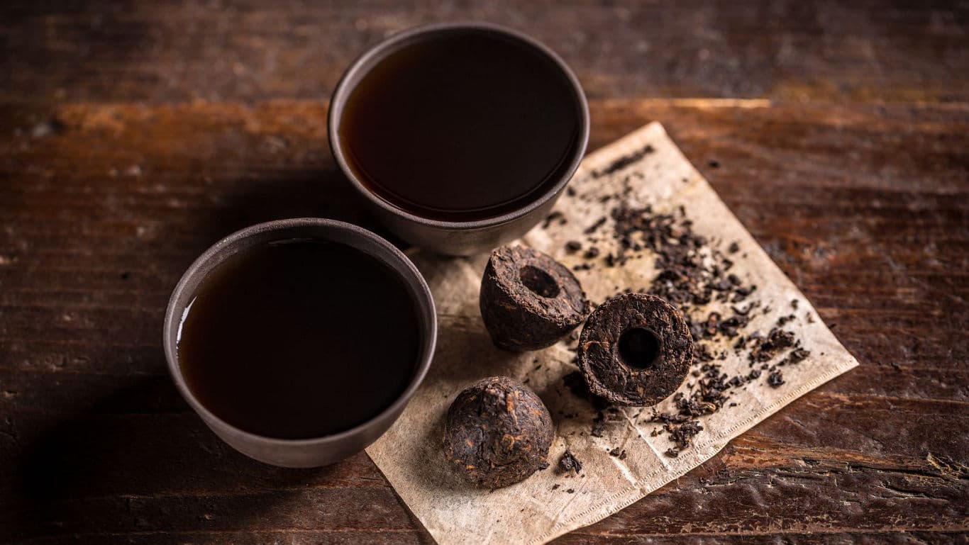 Two cups of dark brewed tea