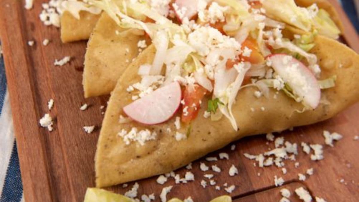 a plate of puffy tacos