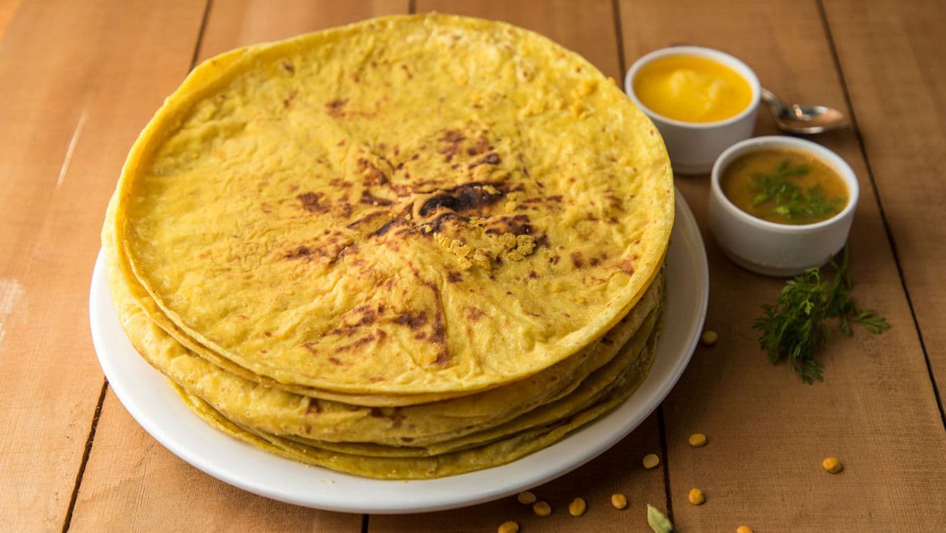 Stack of Indian Puran Poli on White Plate