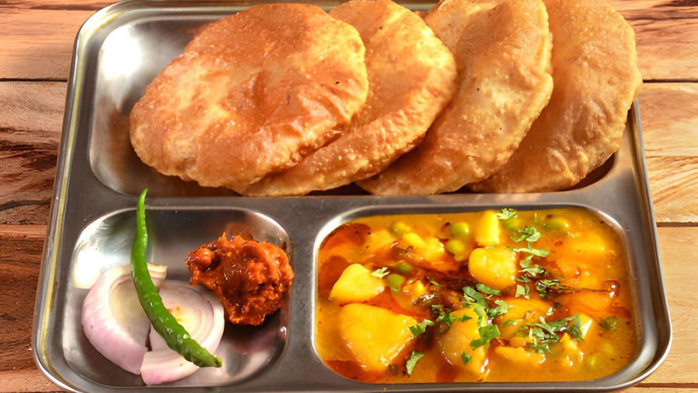 Indian meal with puri and curry