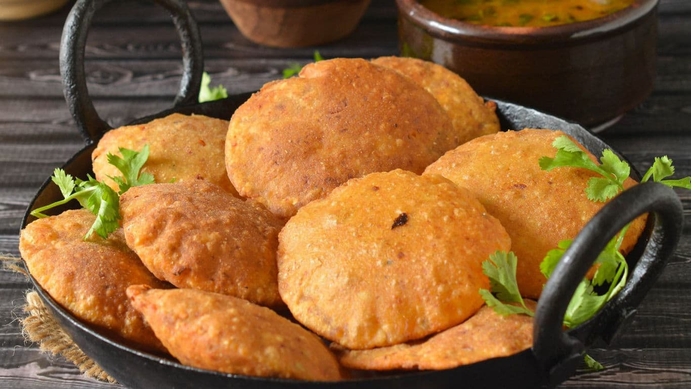 Crispy Indian fried bread in skillet