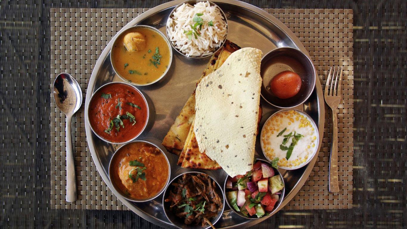 Traditional Indian thali with assorted dishes