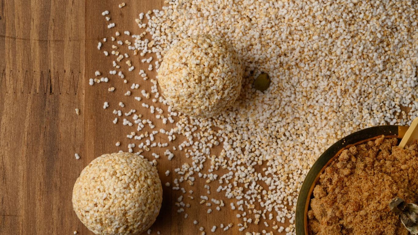Puffed grain dessert balls on wooden table
