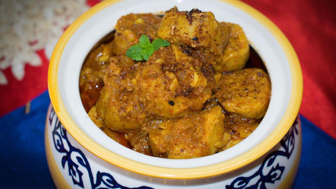 Spiced curry in decorative ceramic bowl