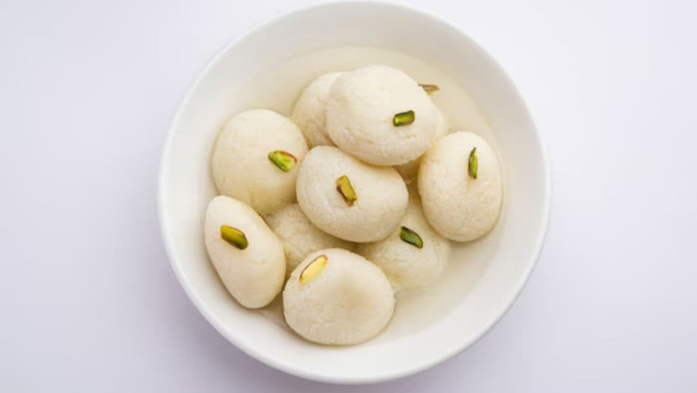 White Rasgullas Garnished with Pistachios