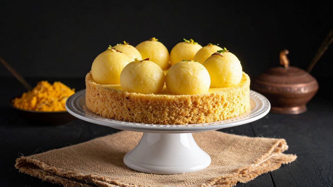 Elegant Indian dessert cake on stand
