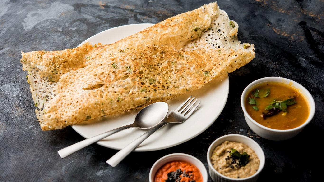 Crispy dosa with chutneys and sambar
