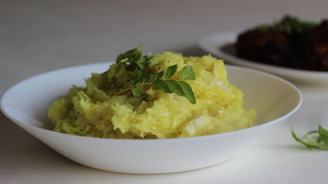 Bowl of raw jackfruit puzhukku