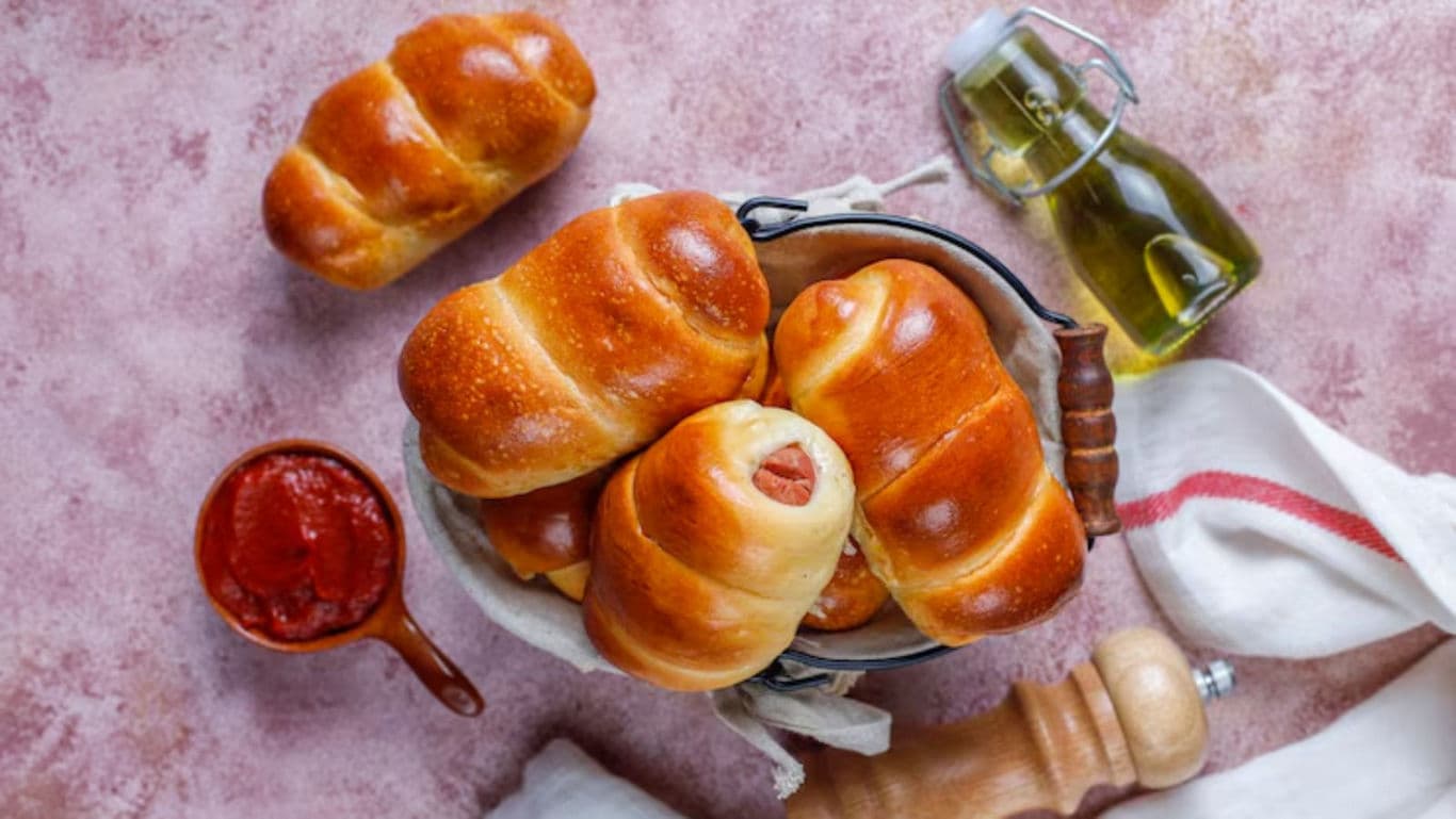 Freshly Baked Sausage Rolls with Sauce