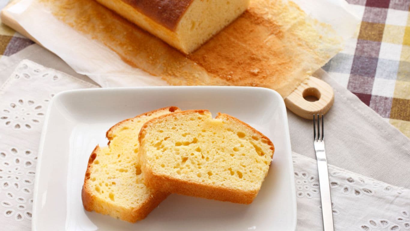 Sliced pound cake on white plate