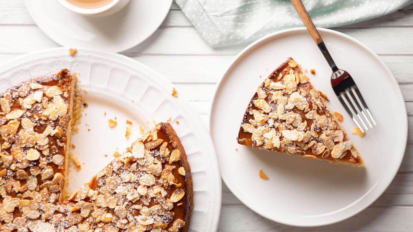 Almond crumble cake slice on plate