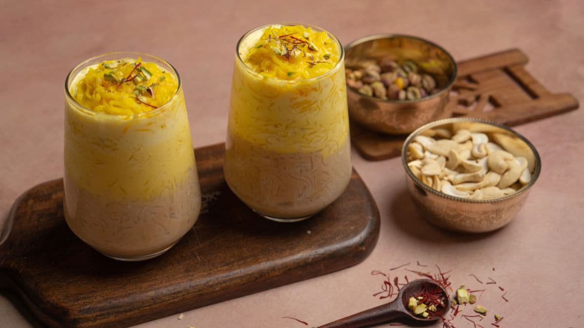 Mango falooda with mango pulp, basil seeds, vermicelli, and kulfi.