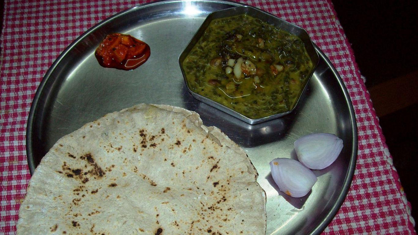 Traditional Indian meal with flatbread and curry