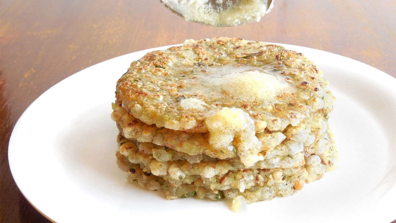Stack of savory pancakes with butter