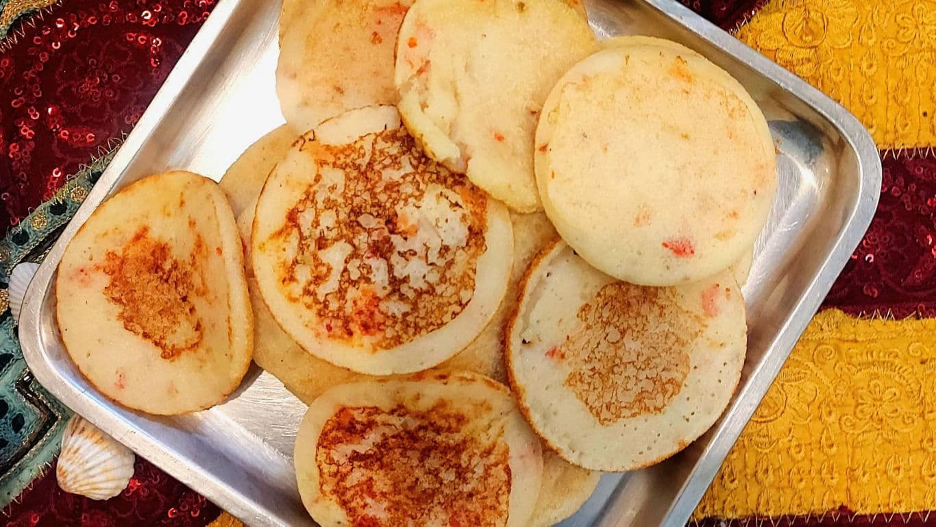 Homemade savory pancakes on metal tray