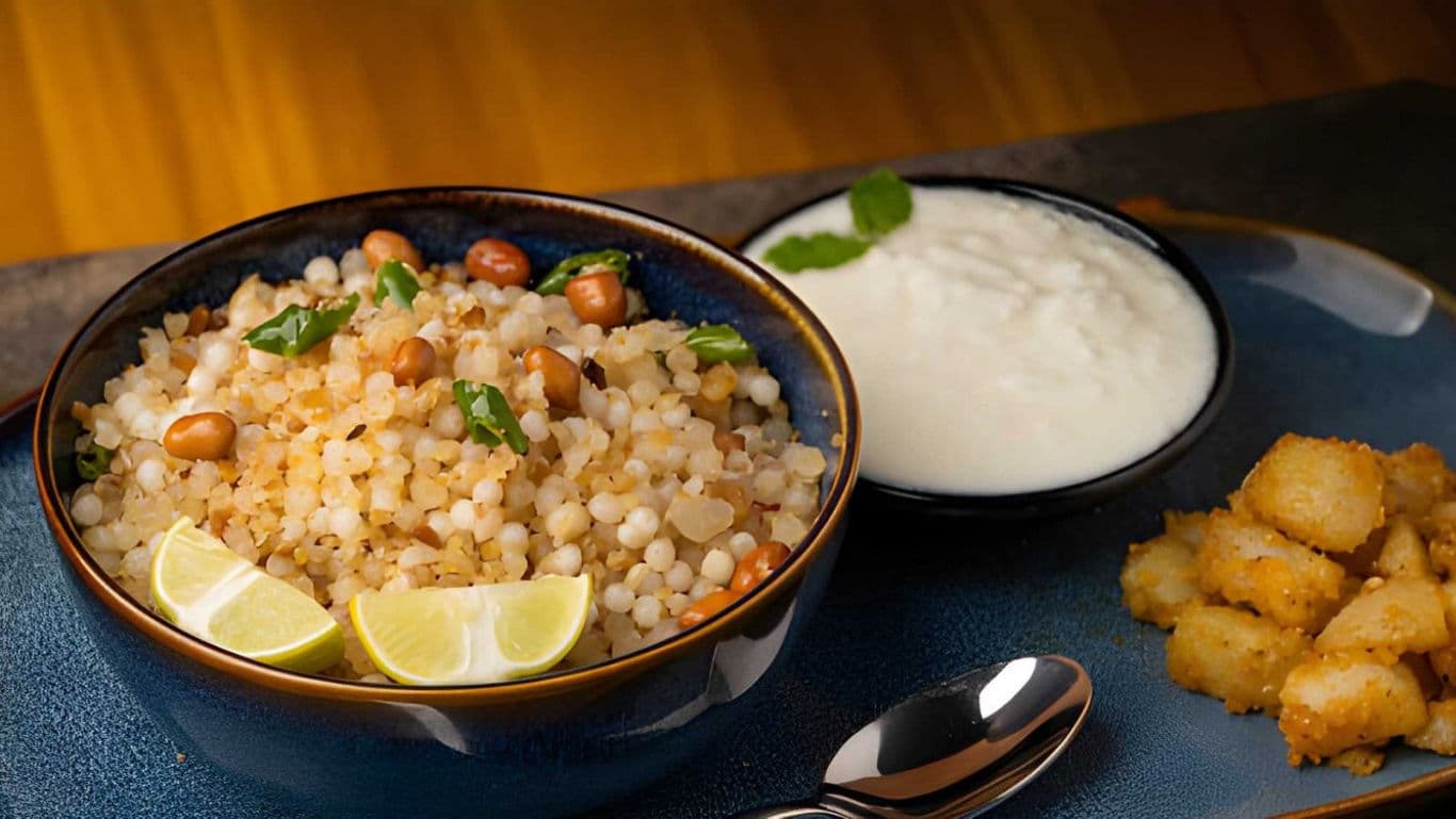 Sabudana khichdi with yogurt and potato cubes served