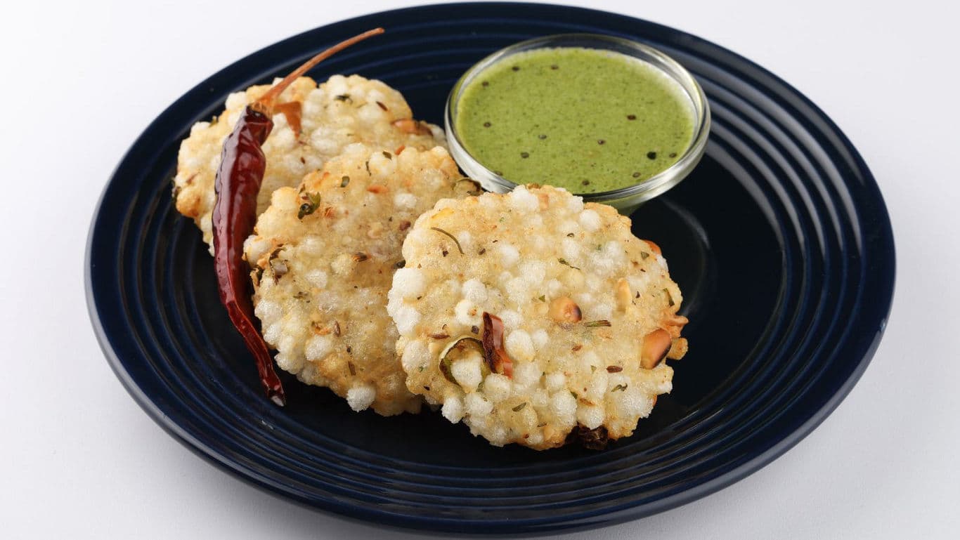 Sabudana Vada with Green Chutney on Blue Plate
