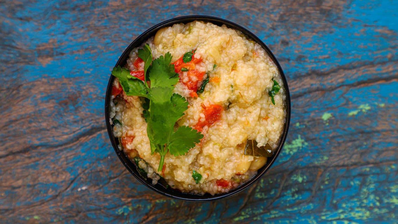Bowl of Quinoa Salad with Fresh Cilantro Garnish