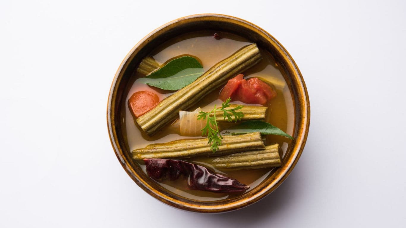 South Indian sambar with drumsticks and vegetables