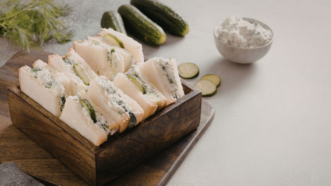 Cucumber Tea Sandwiches in Wooden Box on Table