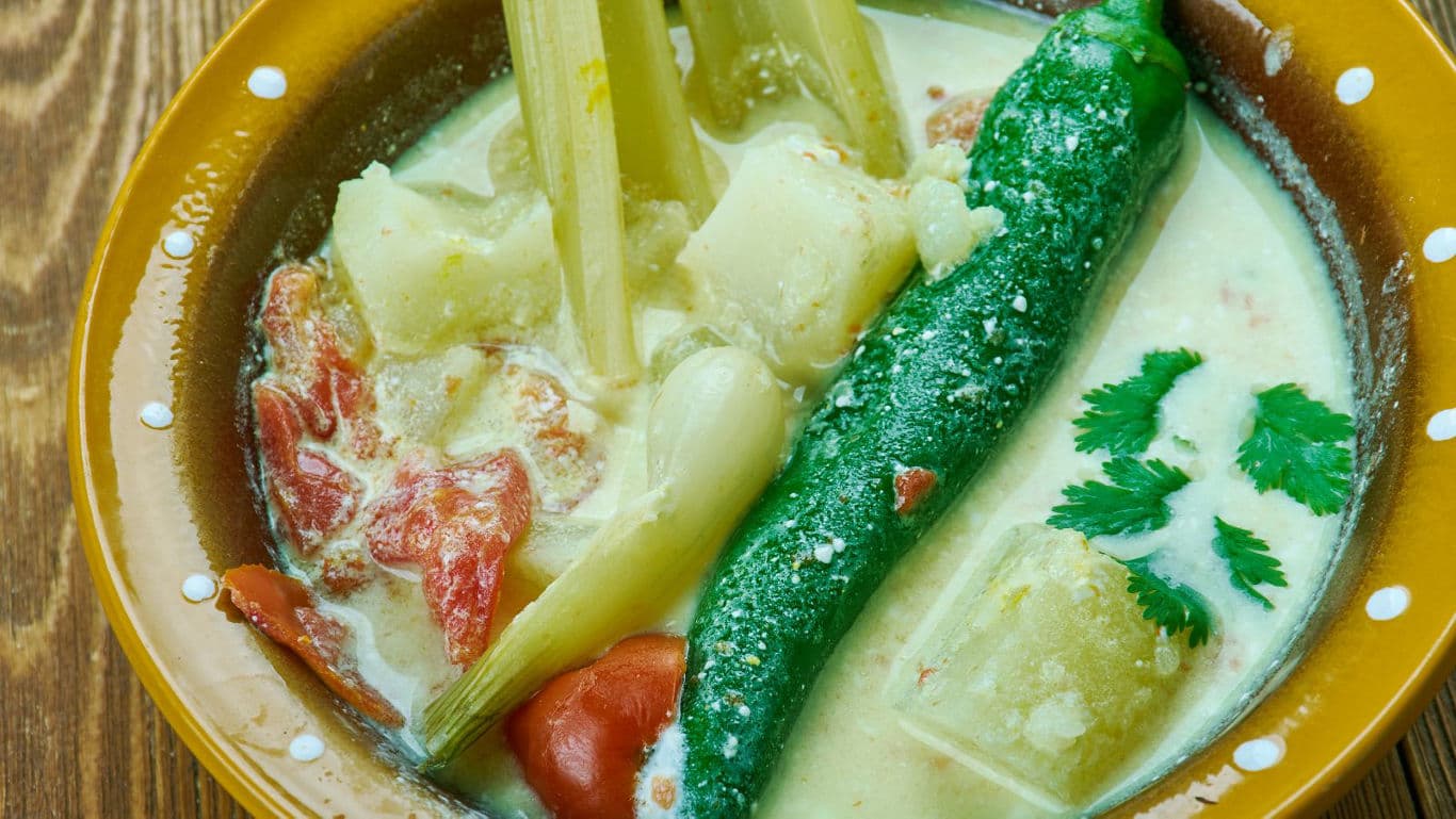 Vegetable stew in creamy white sauce with herbs