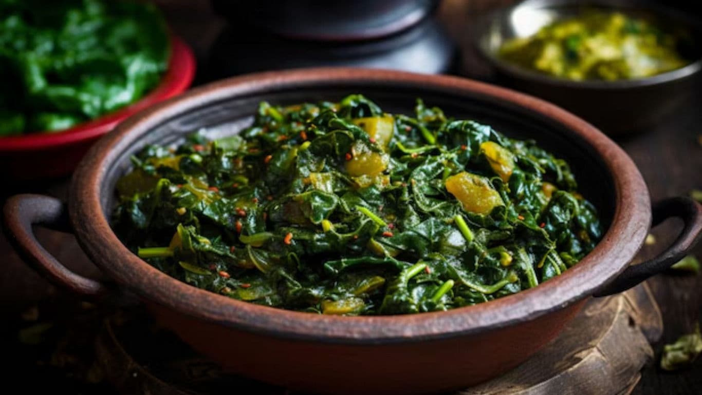 Freshly cooked spinach in rustic bowl