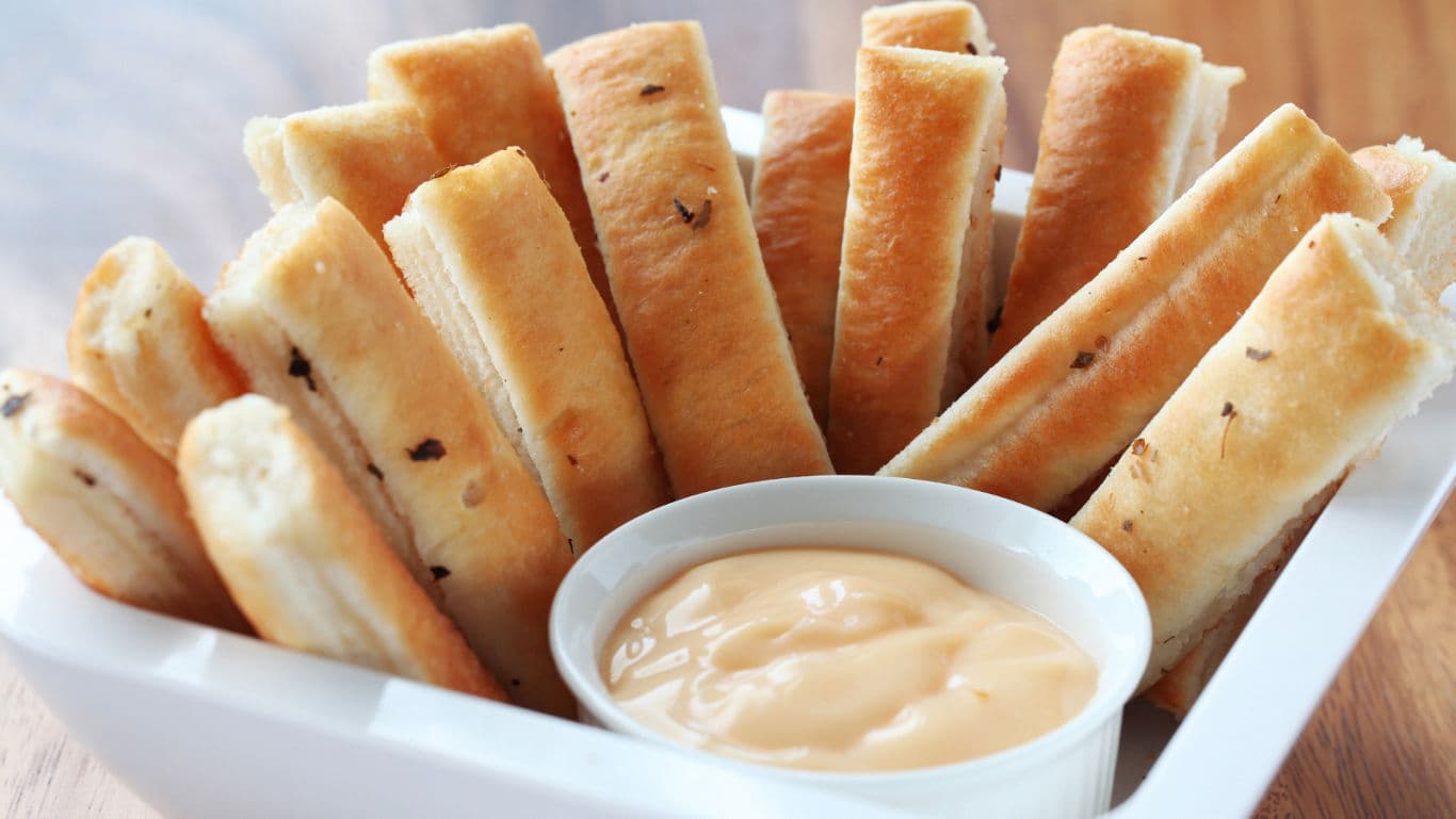 Breadsticks Served With Creamy Cheese Dip